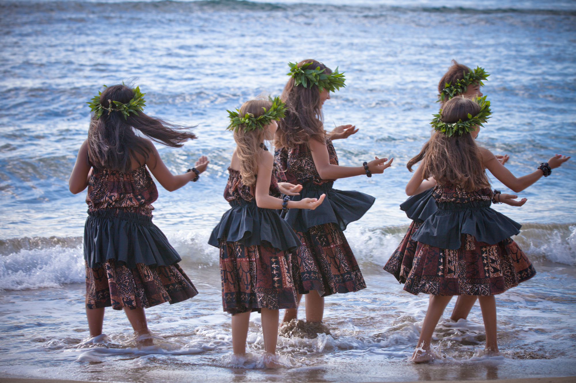 Hula Girls Dancing On A Beach